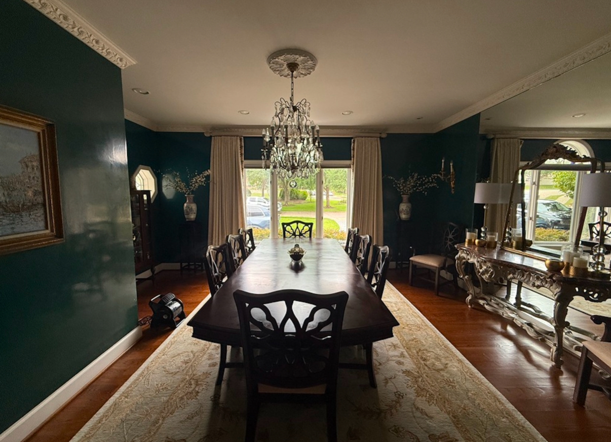 iPhone snapshot of a dining room with ultra-wide distortion and flat lighting