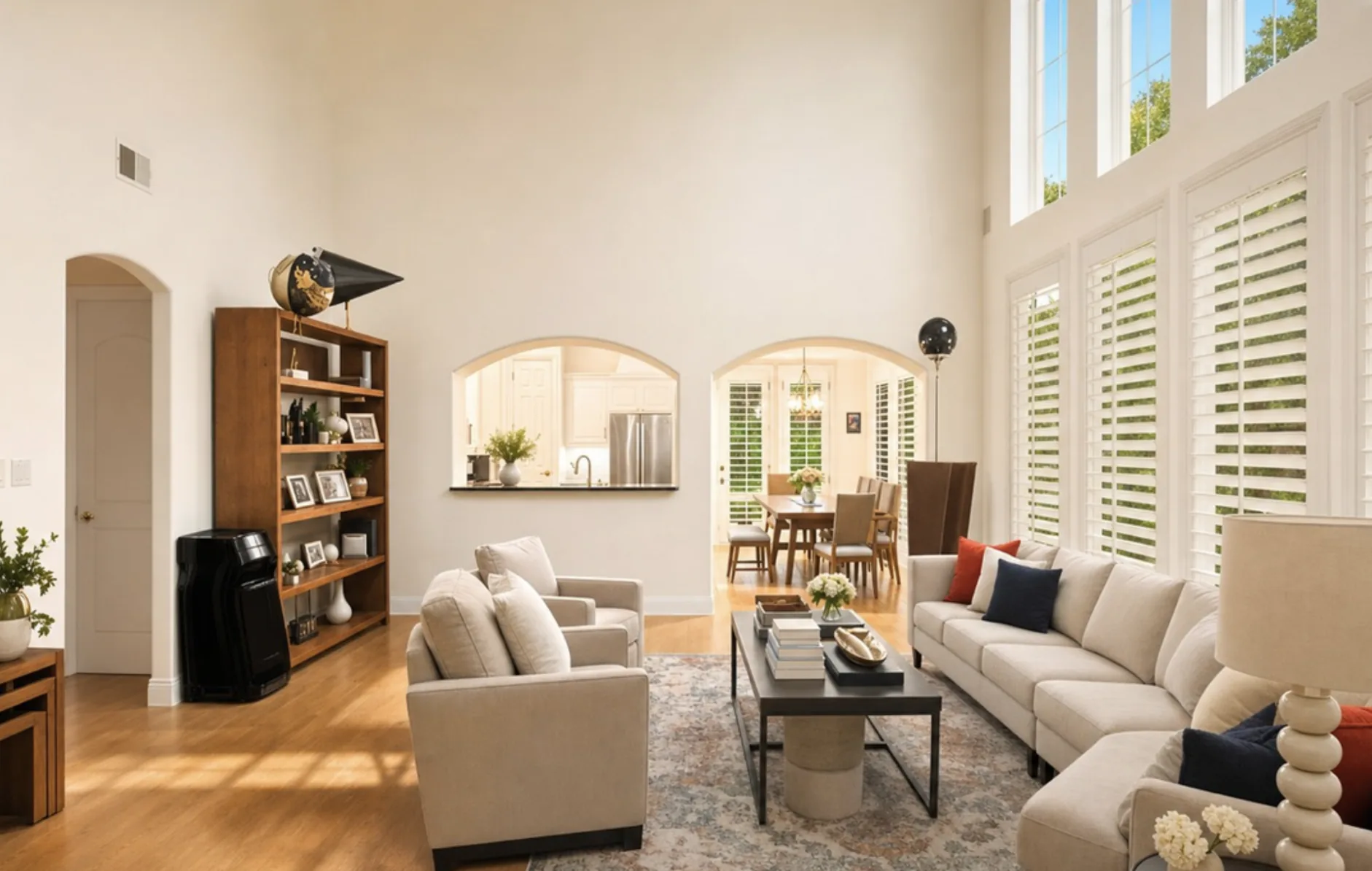 After — same living room, decluttered + brightened
